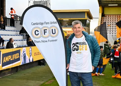 Teardrop Flag - Cambridge Fans United CFU the Fans Trust of Cambridge United Foootball Club have been in existence for 25 years and had a Takeover day where CFU was promoted the feather flags were at the players tunnel when the players emerged wearing CFU warm up t-shirtsMore pictures here httpswwwcambridgefansunitedorgcfu-takeover-day-29th-november-2025-photographs