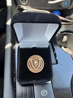 Soft Enamel Pin - Our lapel pin in a car