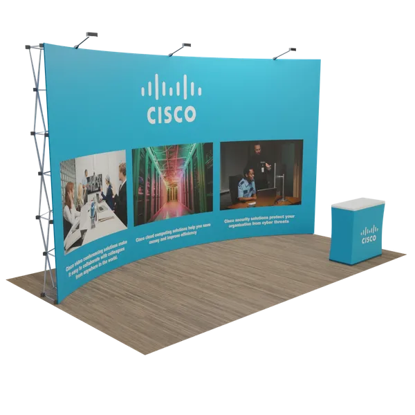 A promotional trade show booth features the Cisco logo and marketing graphics, showcasing technology solutions with a podium for presentations.